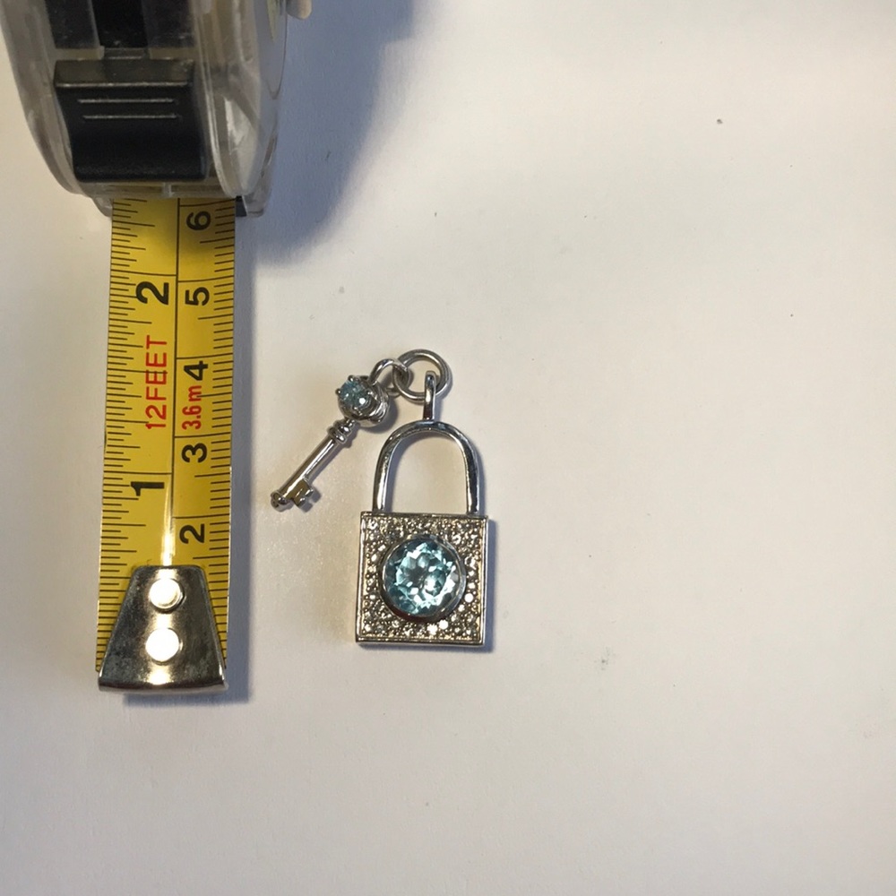 Aquamarine Lock and key charm.